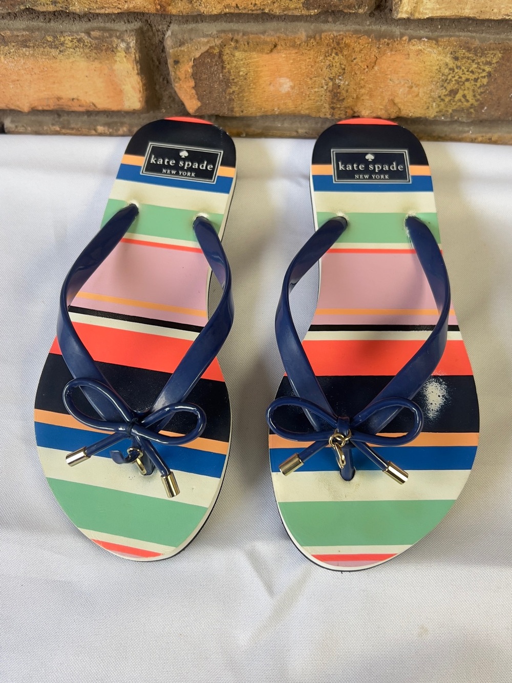 kate spade Navy Multicolor Striped Bow Flip Sandals